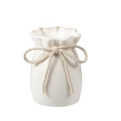 White drawstring bag with measurements on a white background