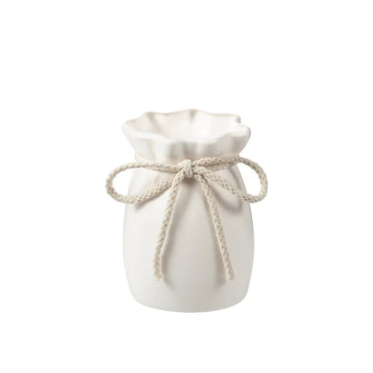 White drawstring bag with measurements on a white background