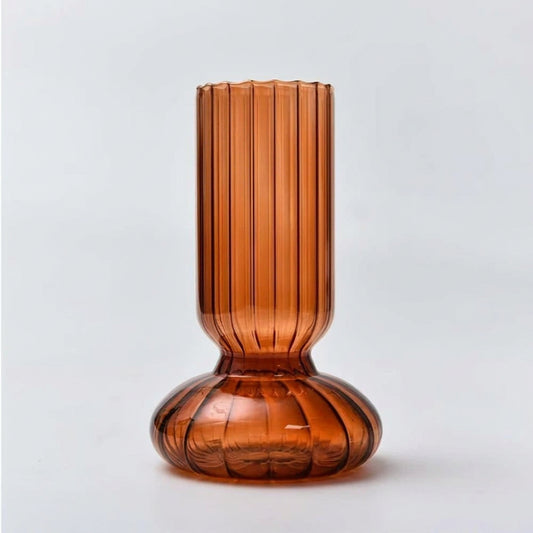 Brown ribbed vase with measurements on a light gray background