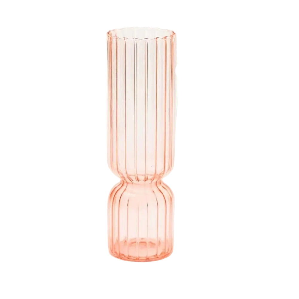 Pink glass vase with measurements on a white background